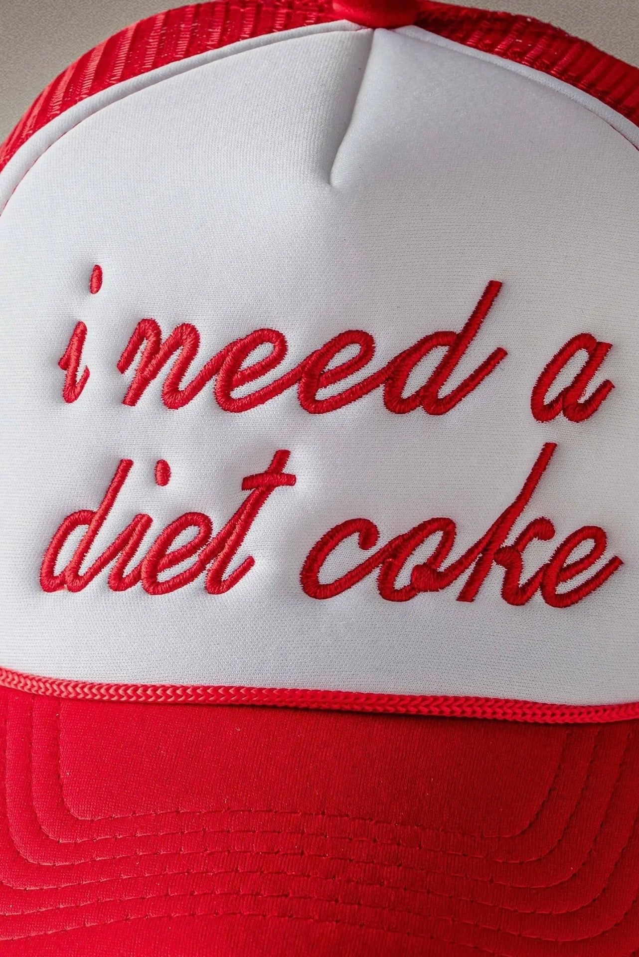 I Need A Diet Coke” Embroidered Script Trucker Hat – Style 