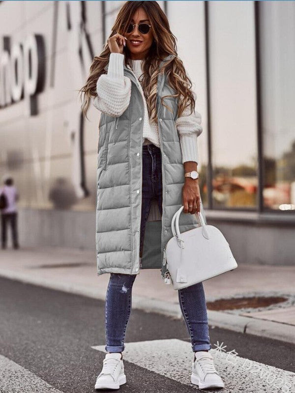 This Long Hooded Puffer Vest Is Making My Comfy Street Style