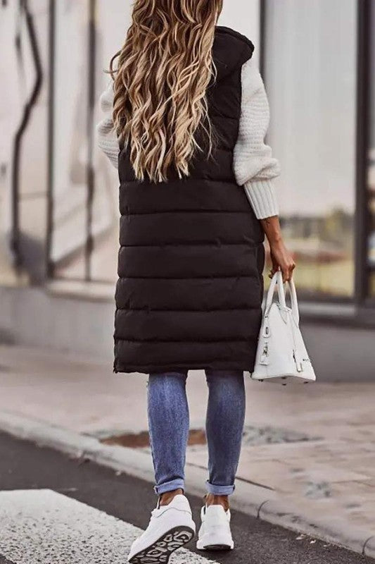 This Long Hooded Puffer Vest Is Making My Comfy Street Style