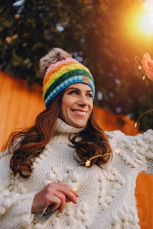 Three Cozy Knit Hats with Pom-poms, Each Featuring a Unique Color and Three Cozy Knit Hats with Pom-poms, Each Featuring a Unique Color and